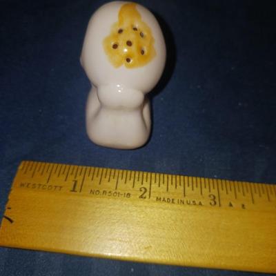 SMALL CERAMIC KEWPIE DOLLS AND A LULLABY CRADLE