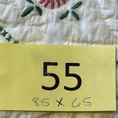 Pink embroidered quilt