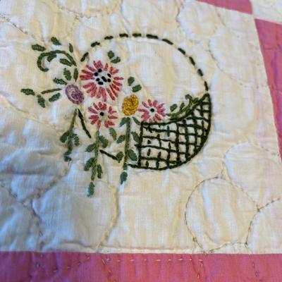 Pink embroidered quilt