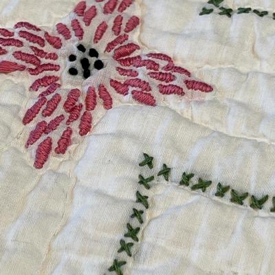 Pink embroidered quilt