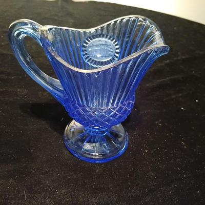 BLUE GLASS CANDLESTICKS, CREAMER AND RELISH DISH