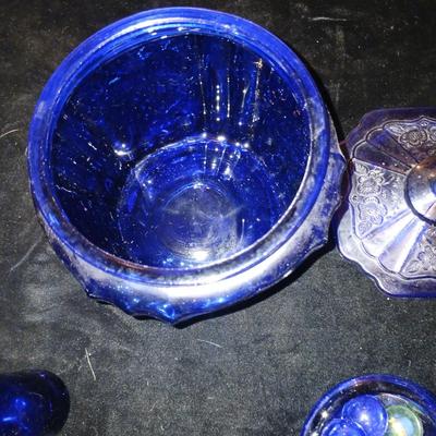 A COLLECTION OF BLUE GLASS
