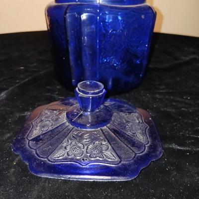 A COLLECTION OF BLUE GLASS