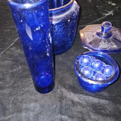 A COLLECTION OF BLUE GLASS