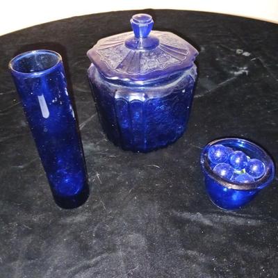 A COLLECTION OF BLUE GLASS