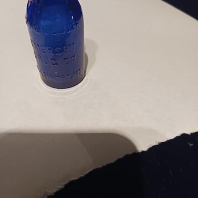 A COLLECTION OF BLUE GLASS