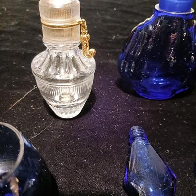 A COLLECTION OF BLUE GLASS