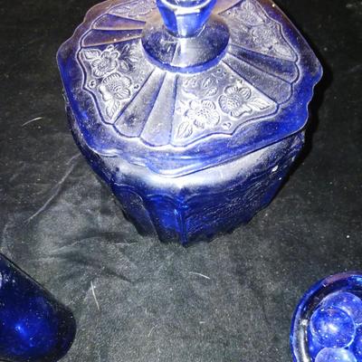 A COLLECTION OF BLUE GLASS