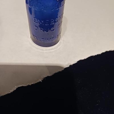 A COLLECTION OF BLUE GLASS