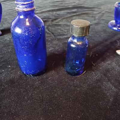BLUE GLASS BOTTLES, PLATTER, CANDLE HOLDERS AND MORE