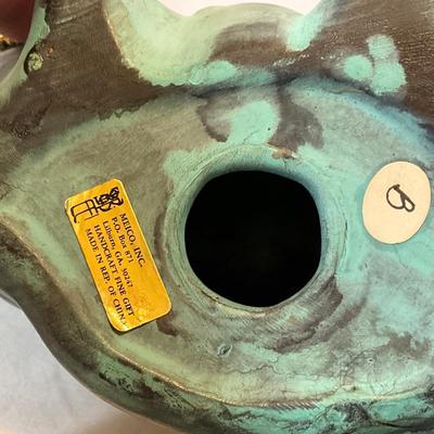 Vintage green ceramic pigs