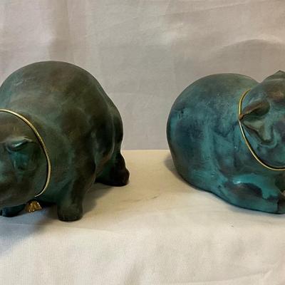 Vintage green ceramic pigs