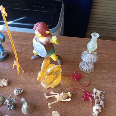 SMALL BRASS BELLS AND AN ASSORTMENT OF PLASTIC FIGURES