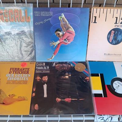 A COLLECTION OF VINYL RECORD ALBUMS (3)