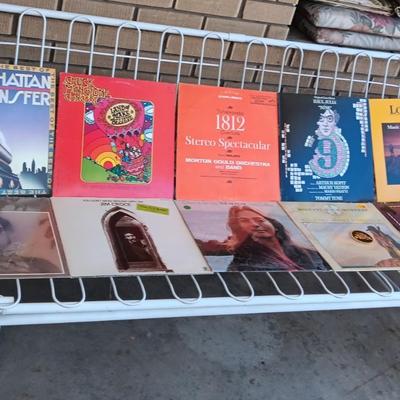 A COLLECTION OF VINYL RECORD ALBUMS (4)