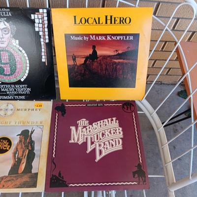 A COLLECTION OF VINYL RECORD ALBUMS (4)