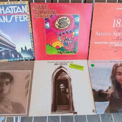 A COLLECTION OF VINYL RECORD ALBUMS (4)