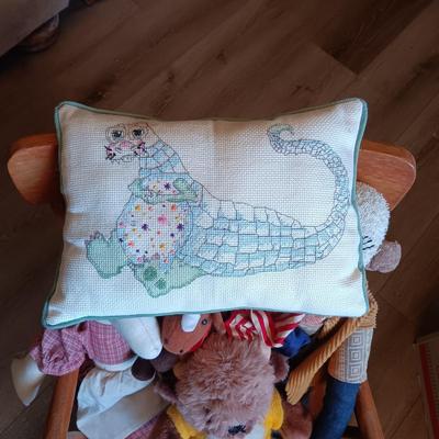 CHILD'S ROCKING CHAIR WITH SOME PLUSH ANIMALS