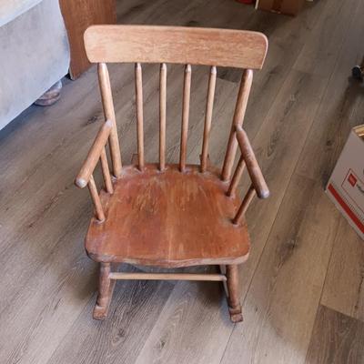 CHILD'S ROCKING CHAIR WITH SOME PLUSH ANIMALS