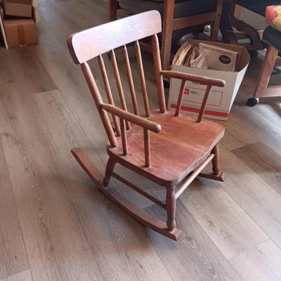 CHILD'S ROCKING CHAIR WITH SOME PLUSH ANIMALS