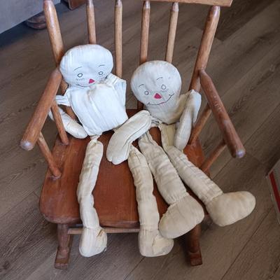 CHILD'S ROCKING CHAIR WITH SOME PLUSH ANIMALS