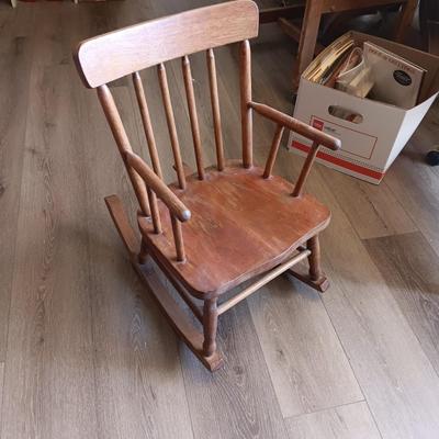 CHILD'S ROCKING CHAIR WITH SOME PLUSH ANIMALS