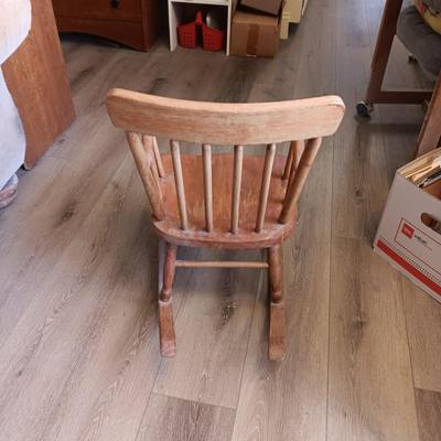CHILD'S ROCKING CHAIR WITH SOME PLUSH ANIMALS