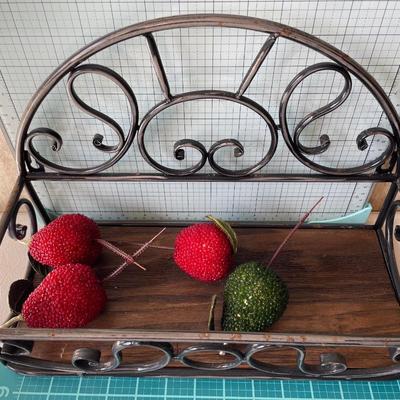 Metal and wood window decor with fruit