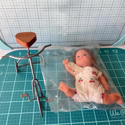 1976 doll and small trike decor
