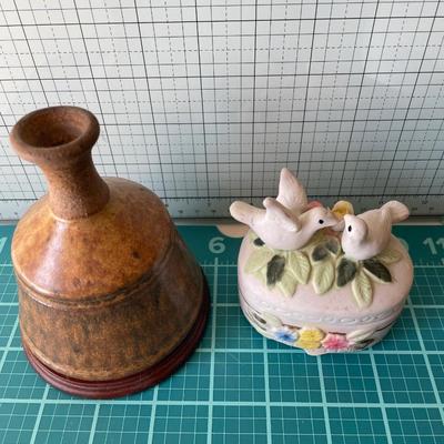 Ceramic vase, dove and clock