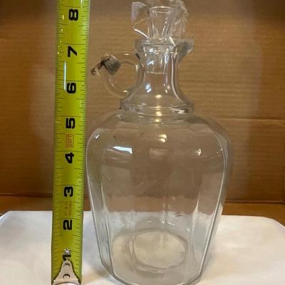 Antique bottle with spout and stopper