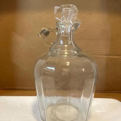 Antique bottle with spout and stopper