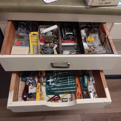 DRAWER FULL OF HARDWARE AND SOME HAND TOOLS