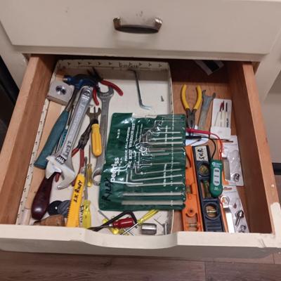 DRAWER FULL OF HARDWARE AND SOME HAND TOOLS