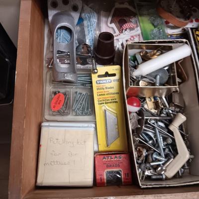 DRAWER FULL OF HARDWARE AND SOME HAND TOOLS