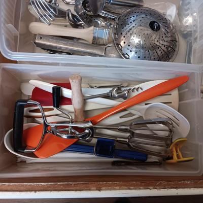 A VARIETY OF KITCHEN UTENSILS