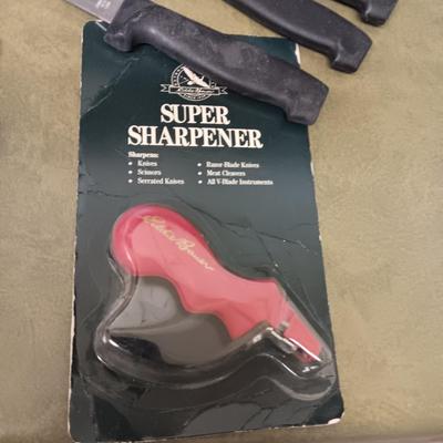 SET OF GOURMET TRADITIONS CUTLERY AND AN EDDIE BAUER SHARPENER