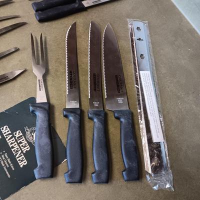 SET OF GOURMET TRADITIONS CUTLERY AND AN EDDIE BAUER SHARPENER