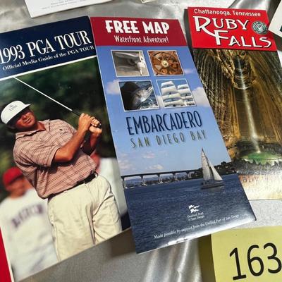 Basket of sports books and paper