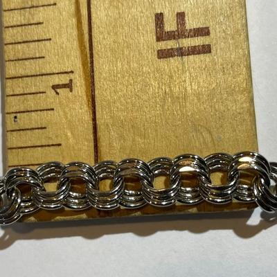 Vintage Sterling Silver Never Worn Condition 7.5" Long Charm Bracelet 1/3" Wide in Great Condition.