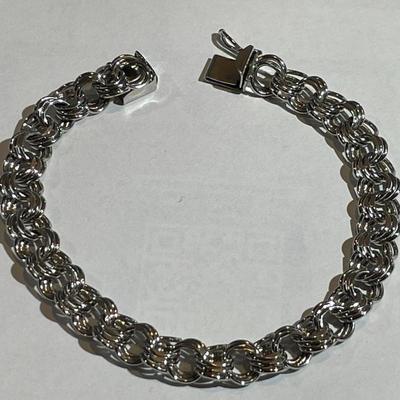 Vintage Sterling Silver Never Worn Condition 7.5" Long Charm Bracelet 1/3" Wide in Great Condition.