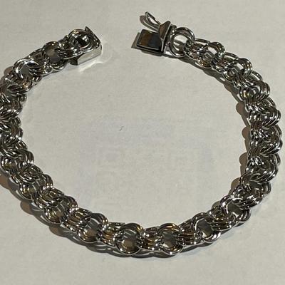 Vintage Sterling Silver Never Worn Condition 7.5" Long Charm Bracelet 1/3" Wide in Great Condition.