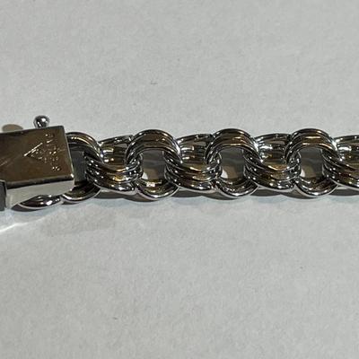 Vintage Sterling Silver Never Worn Condition 7.5" Long Charm Bracelet 1/3" Wide in Great Condition.