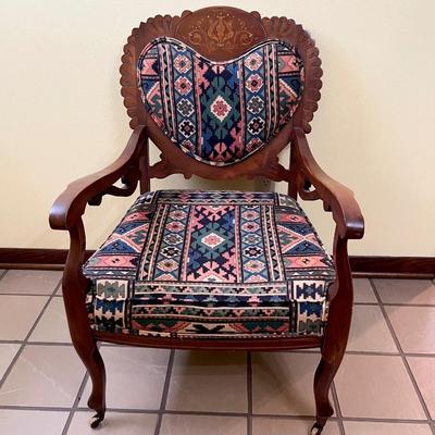 Vtg. Solid Wood Carved Chair With Wood Casters