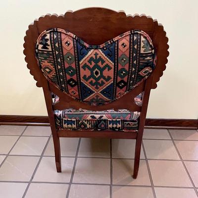 Vtg. Solid Wood Carved Chair With Wood Casters