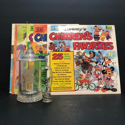 LOT 19U: Disney Collection - Mickey Mouse 3 Musketeers Glass Stein, Tinkerbell Pewter Bell & Vintage Vinyl Records: 1973 Robin Hood, 1966...