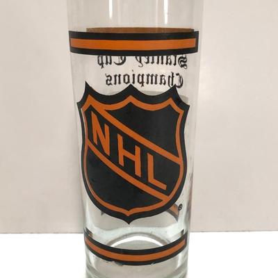 LOT 204U: Signed Philadelphia Flyer's Hockey Pucks (Tim Kerr & Ric MacLeish), Flyers Stanley Cup Glasses & Binder full of Hockey Trading...