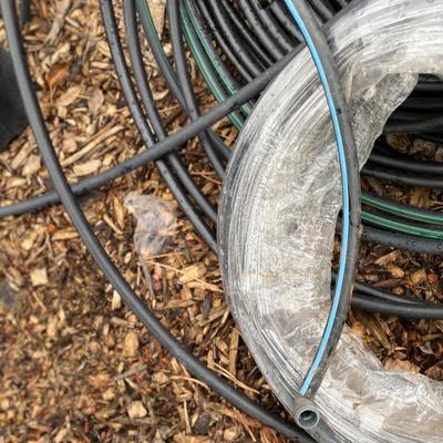 SPRINKLER LINE, METAL TRASH CAN AND MORE