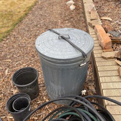 SPRINKLER LINE, METAL TRASH CAN AND MORE