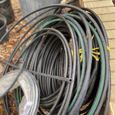 SPRINKLER LINE, METAL TRASH CAN AND MORE